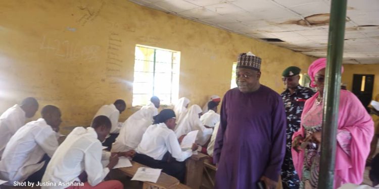 The Registrar and Chief Executive Officer of the National Business and Technical Examinations Board (NABTEB), Dr. Mohammed Aminu Mohammed, supervising the examination at the Government Technical College, Minna...on Friday.