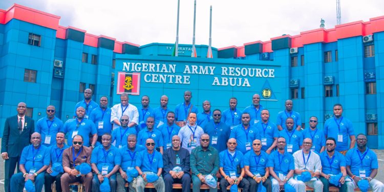 The Director General, Nigerian Army Resource Centre, Abuja, Rtd Maj-Gen. Garba Ayodeji Wahab (7th left front row); the Administrator, Presidential Amnesty Programme Dr Dennis Otuaro (7th right front row), in group photograph with some PAP stakeholders during the opening ceremony of a leadership, alternative dispute resolution and mediation training for the programme's stakeholders at the resource centre on Wednesday, July 16, 2025. Photo Credit: PAP