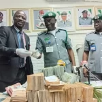 Alt="From left, Assistant Commander of EFCC, Richard Adejumo, Customs Area Controller of the command, Comptroller Chidi Nwokorie, and DC NI Maduemezie, Deputy Comptroller in charge of Administration, during the handover at Muritala Muhammed International Airport in Lagos on Tuesday"