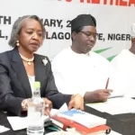 From left: INEC National Commissioner, May Agbamuche-Mbu; INEC National Chairman, Prof. Joash Amupitan and INEC Resident Electoral Commissioner in Lagos State, Prof. Ayobami Salami, at the induction/retreat for the newly appointed INEC Chairman, National Commissioners and RECs in Lagos...on Friday.