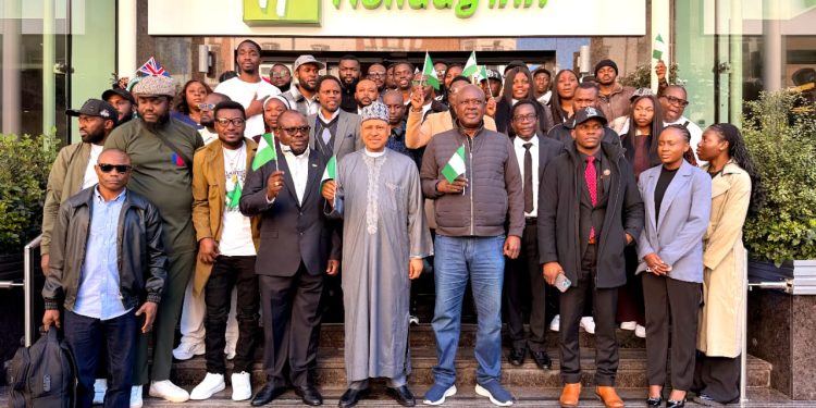 Minister of Information, Mohammed Idris (middle front row); Minister of State for Petroleum, Senator Heineken Lokpobiri (right); Administrator of the Presidential Amnesty Programme, Dr Dennis Brutu Otuaro (left), in group photograph with PAP foreign scholarship beneficiaries studying in UK universities during the interactive session organized in London by Dr Otuaro on the sidelines of President Bola Tinubu's state visit to the United Kingdom on Wednesday.
