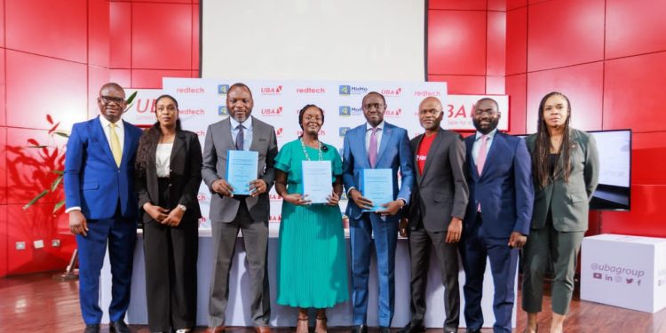L-R: Manager, Partnership & Ecosystem, MTN/MoMo PSB, Emmanuel Akhigbe; Head Human Resource,MTN/MoMo PSB , Rabi Adetoro; Managing Director/ CEO, Redtech Limited, Emmanuel Ojo; Chief Executive Officer, MTN MoMo, Omolara Michael Nwadu; Group Head, Digital Banking, United Bank for Africa(UBA), Olukayode Olubiyi; Head of Sales, MTN/MoMo PSB, Lanre Raheem; Head, Business Development,MTN/MoMo PSB, Ahmad Turajo; and Group Head, Marketing and Corporate Communications, UBA, Alero Ladipo, during the launch of payment interoperability partnership targeted at expanding cardless payment access for consumers and merchants across Nigeria and Africa, powered by Redtech, MoMo PSB and UBA at the UBA House Marina...on Tuesday.