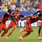 21 June 2026; Kevin Pina of Cabo Verde celebrates after scoring her side's first goal with team-mates, including Roberto Lopes, 4, during the 2026 FIFA World Cup Group H match between Uruguay and Cabo Verde at Miami Stadium in Miami, Florida, USA. Photo by Michael Pimentel/Sportsfile