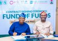 L-R: Wale Adeosun, MD/CEO, Kuramo Capital Management, with Olasupo Olusi, MD/CEO, Bank of Industry (BoI), during the contract signing for a minimum fund size of $170 million for the DICE Fund of Funds Management between BoI and Kuramo Capital Management, in Abuja...on Tuesday.