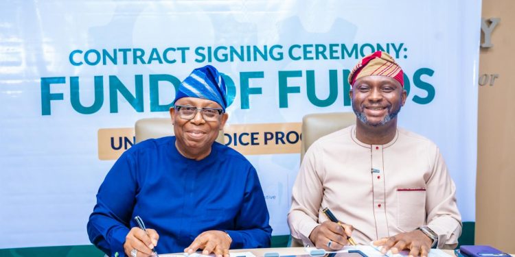 L-R: Wale Adeosun, MD/CEO, Kuramo Capital Management, with Olasupo Olusi, MD/CEO, Bank of Industry (BoI), during the contract signing for a minimum fund size of $170 million for the DICE Fund of Funds Management between BoI and Kuramo Capital Management, in Abuja...on Tuesday.
