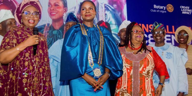 L-R: The District 9112 Governor-Elect, Uyi Sowebi addressing the newly installed President of Rotary Club of Lagos, Olutoyin Odulate as the Immediate Past President of the club, Toki Mabogunje and other Rotary leaders looked at the Metropolitan Club, Victoria Island, Lagos.
