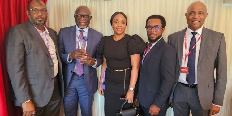 L-R: Executive Director, Asset Management Corporation of Nigeria (AMCON), Dr Aminu Muhtar Dan Amu; the award recipient, and Managing Director/CEO, AMCON, Mr Gbenga Alade; his wife, Mrs Yetunde; Head, Corporate Communications Department, Mr Jude Nwauzor; and a Non-Executive Director, and Board Member of AMCON, Mr Charles Iyore, at the just concluded 16th African Business Leadership Awards (ABLA) at House of Lords, United Kingdom.