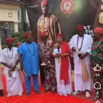 Alt="The Omu Ahaba of Asaba Community, Chief Ada Biosah flanked by the Ndi Eze Ahaba, of Asaba community in Sunday in Asaba"