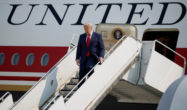 U.S. President Donald Trump disembarks the new Air Force One, a plane gifted by the Qatari government, as he arrives at Bismarck Municipal Airport in Bismarck, North Dakota, U.S., July 1, 2026. REUTERS/Evan Vucci