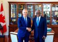 Prime Minister of Canada, Mark Carney (left), welcomes the President and Chief Executive of Dangote Group, Aliko Dangote, to his office in Canada during discussions on potential investment opportunities and strategic partnerships