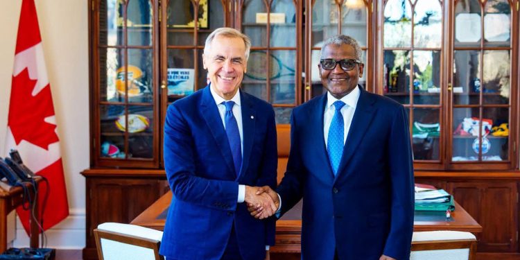 Prime Minister of Canada, Mark Carney (left), welcomes the President and Chief Executive of Dangote Group, Aliko Dangote, to his office in Canada during discussions on potential investment opportunities and strategic partnerships
