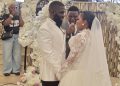 The couple exchanging vows