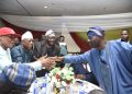 Governor Babajide Sanwo-Olu of Lagos State (Special Guest Speaker) greeting Shodipe-Dosunmu, Chief Dare Babarinsa and Akogun Kola Onadipe during the event.