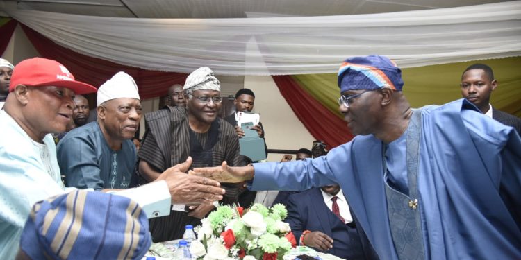 Governor Babajide Sanwo-Olu of Lagos State (Special Guest Speaker) greeting Shodipe-Dosunmu, Chief Dare Babarinsa and Akogun Kola Onadipe during the event.