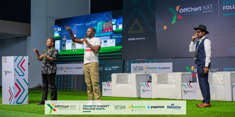 Founder, UbuntuCare Africa, Chukwunonimem Michael Ike (middle) with other participants on stage during the town hall interactive session at the OffChart NXT 2026 Summit in Port Harcourt.
